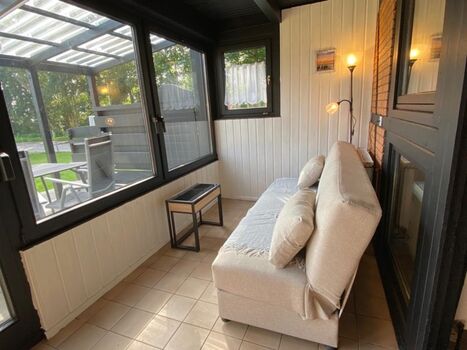 Wintergarten mit Ausziehsofa