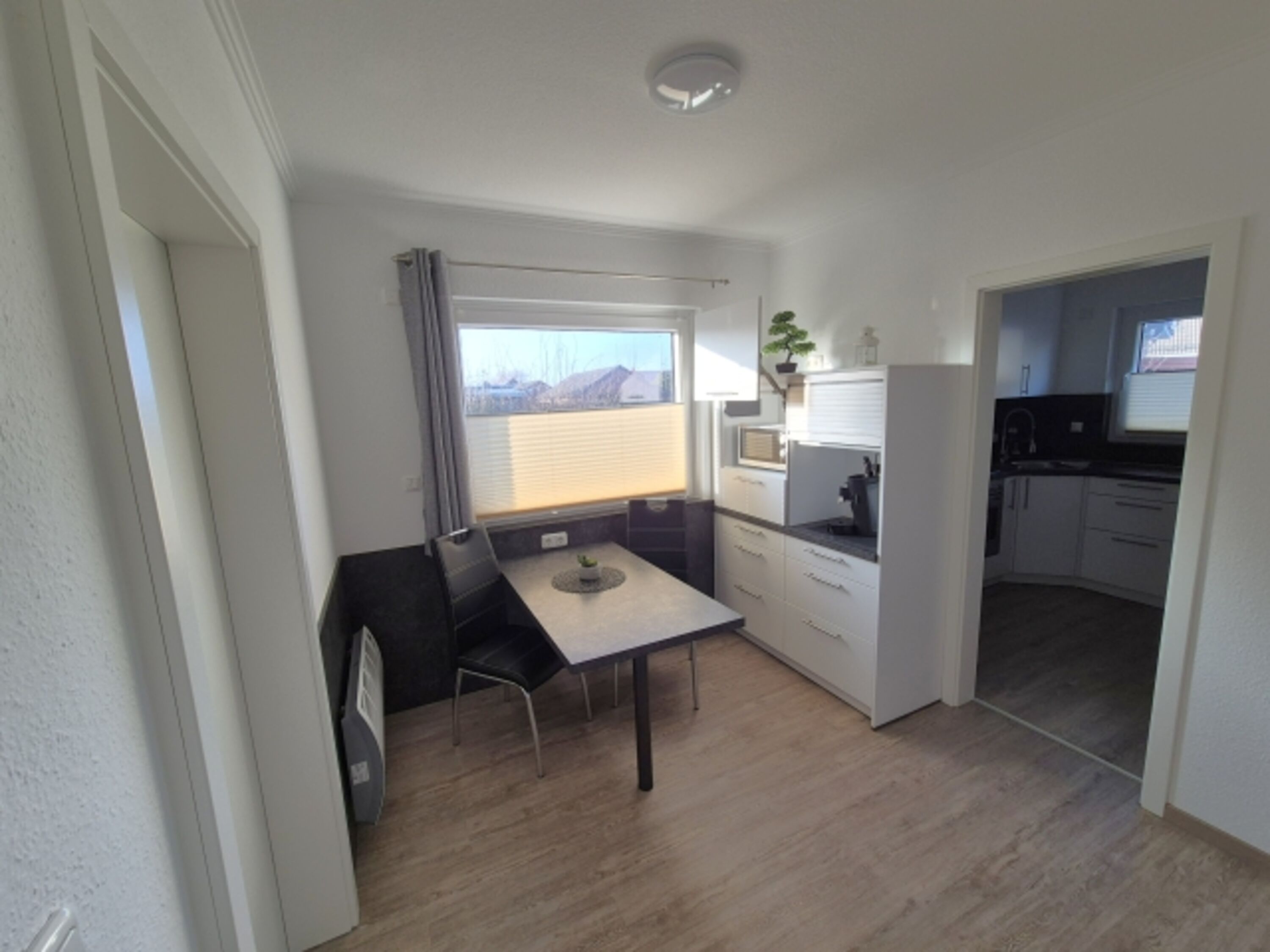 Mikrowelle im Essbereich Ferienhaus Helmsand 3 Friedrichskoog Nordsee