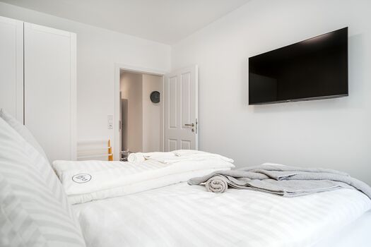 Helles Schlafzimmer 2 mit Boxspringbett