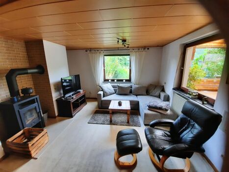 Ihr großes Wohnzimmer mit 2 Schlafsofas und Kamin