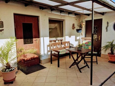 Überdachte Sitzecke 