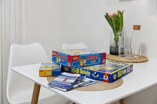 Spielesammlung und Flyer liegen bereit