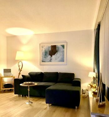 Wohnzimmer mit ausziehbarer Schlafcouch Guido Maria Kretschmer