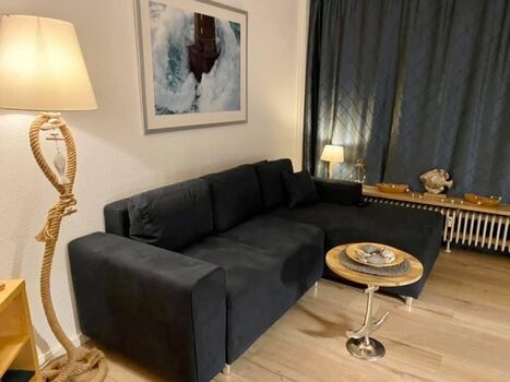 Wohnzimmer mit ausziehbarer Schlafcouch Guido Maria Kretschmer