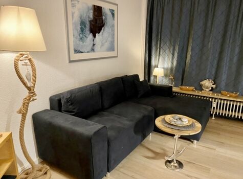 Wohnzimmer mit ausziehbarer Schlafcouch Guido Maria Kretschmer