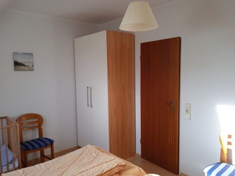 Schlafzimmer 1 im 1.OG mit Doppelbett Foto II