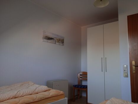 Schlafzimmer 2 im 1.OG mit 2 Einzelbetten Foto II