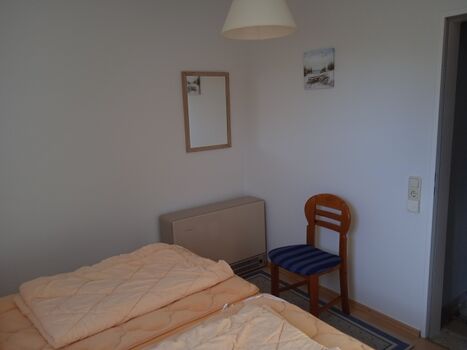 Schlafzimmer 1 im 1.OG mit Doppelbett Foto II