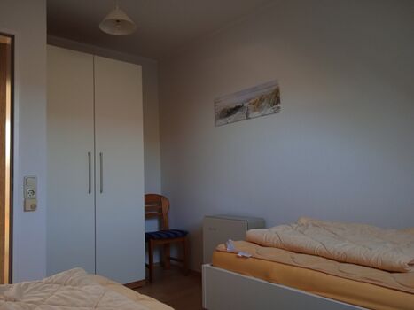 Schlafzimmer 2 im 1. OG Foto II