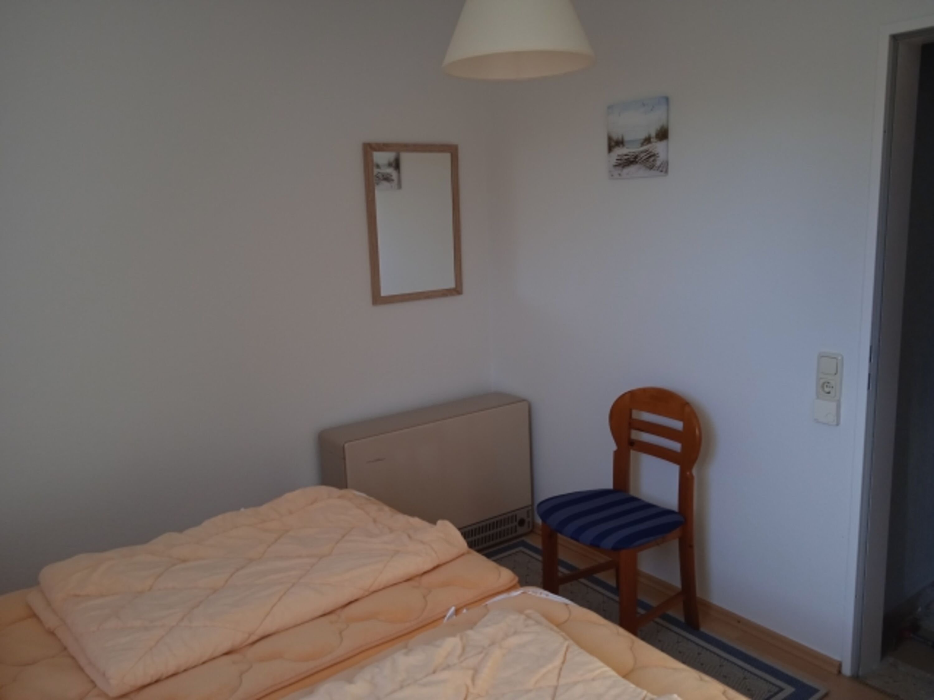 Schlafzimmer 1 im 1.OG mit Doppelbett Foto II
