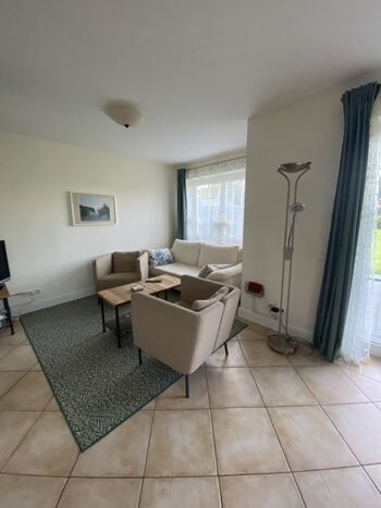 Gemütliches Wohnzimmer mit Schlafcouch für entspannte Abende