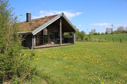 Ferienhaus Hagebutte mit schönem Ausblick von der großen überdachtenTerrasse