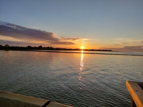 Sonnenuntergang vom Wattensteg in Burhave