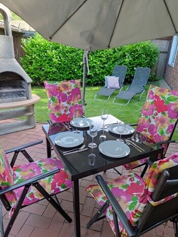 Sonnenterrasse mit Kamingrill