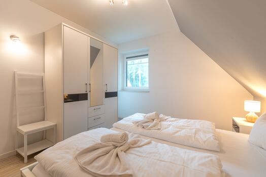 Schlafzimmer mit Doppelbett