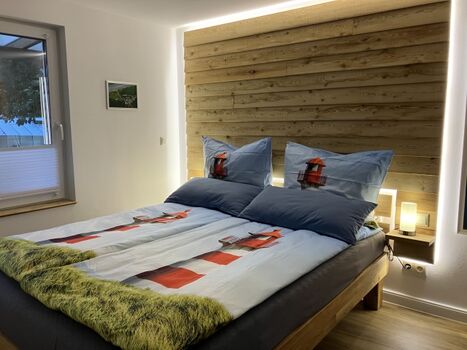 Schlafbereich mit echtem Lärchenholz