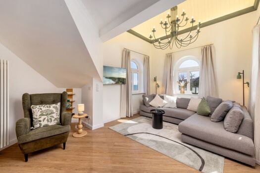 Wohnzimmer mit gemütlicher Sitzlandschaft.