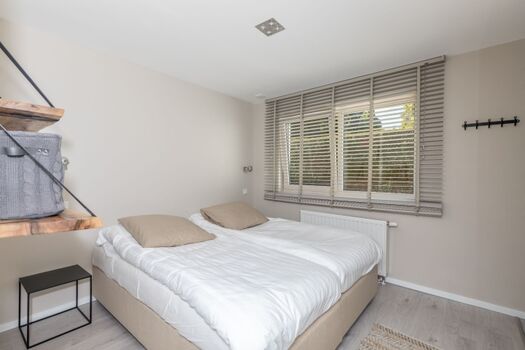 Das Hauptschlafzimmer mit Luxus-Boxspring