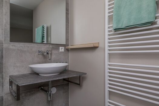 En Suite Badezimmer mit italienischer Dusche