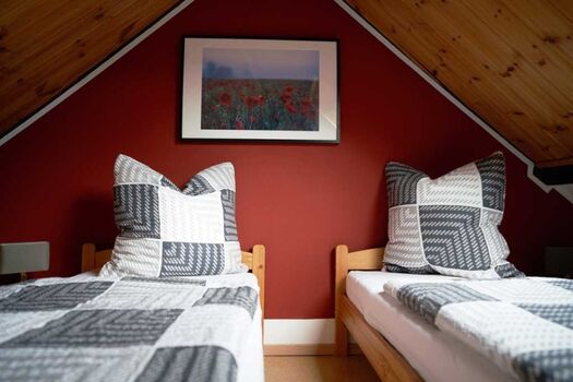 Schlafzimmer unter dem Dach