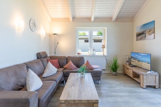 Wolken Blick: Wohnbereich mit TV