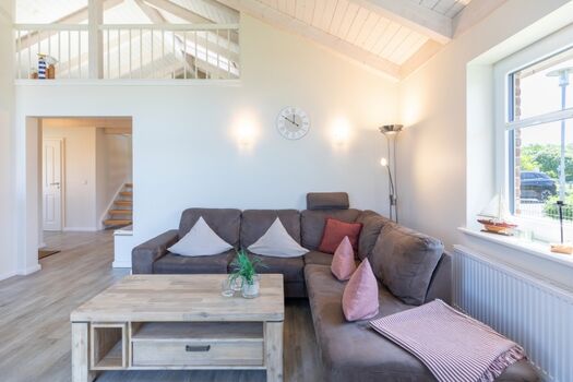 Wolken Blick: Wohnbereich mit bequemer Sitzecke