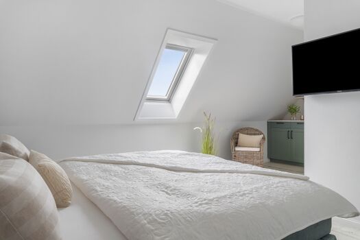 Blick in ein Schlafzimmer im OG