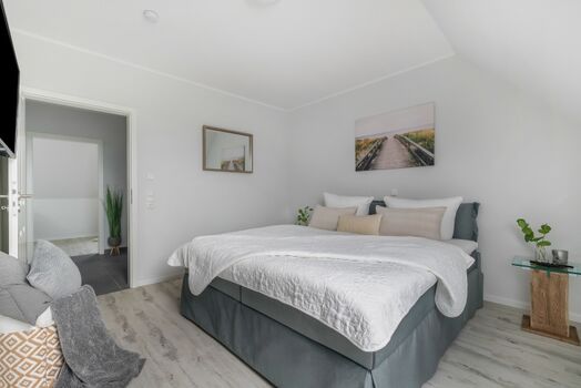 Blick in ein Schlafzimmer im OG