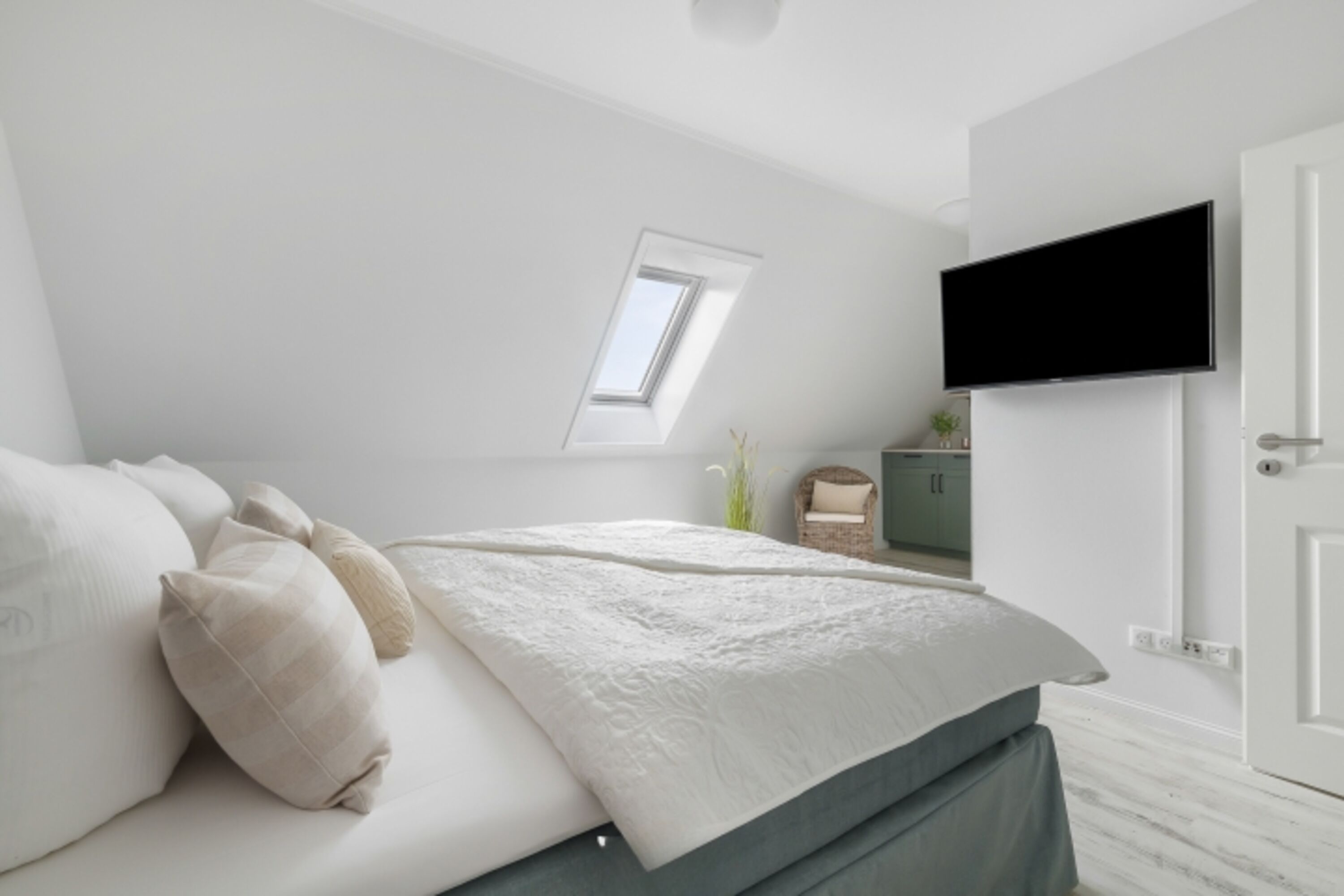Blick in ein Schlafzimmer im OG