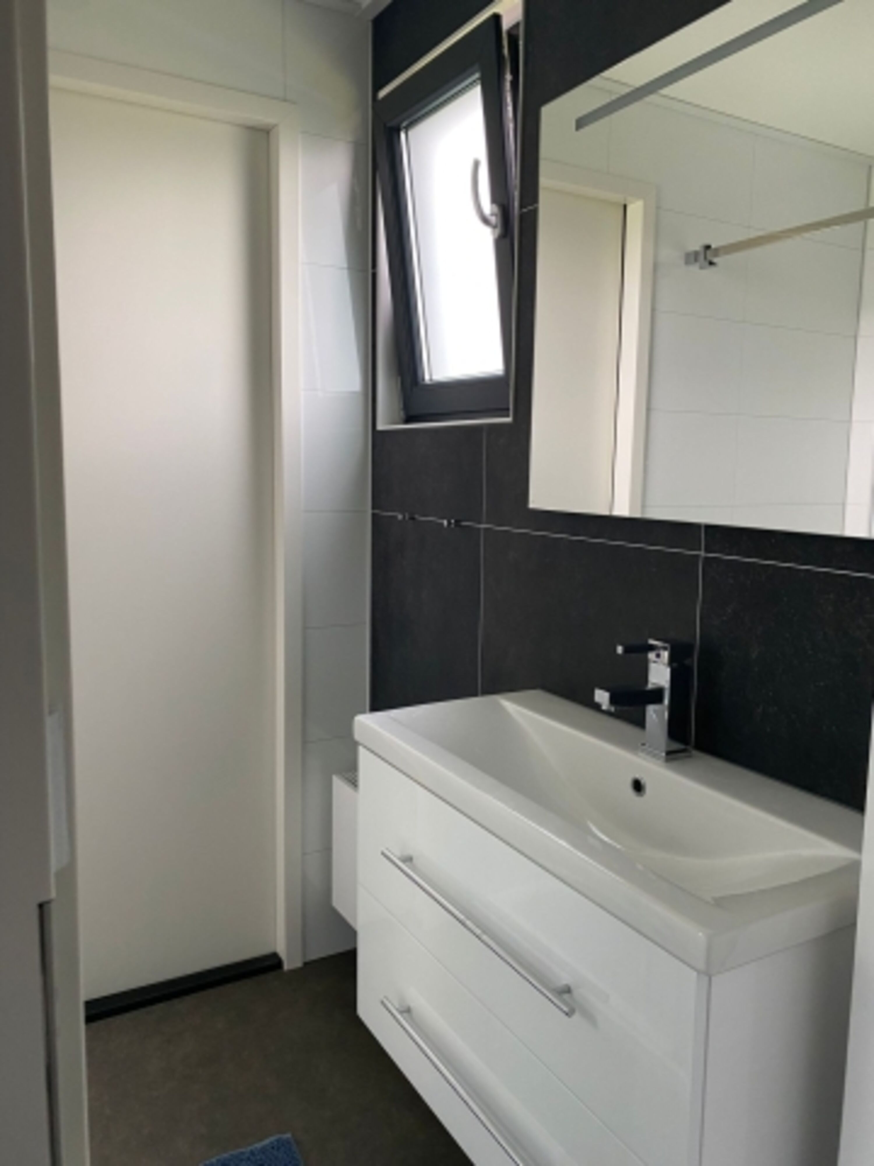 Badezimmer mit Tageslicht und Rainshower-Dusche