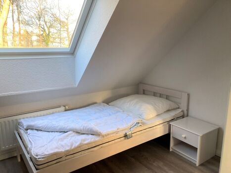 Schlafzimmer 2 mit zwei Einzelbetten