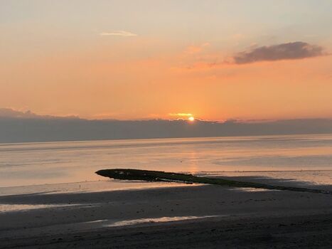 Sonnenuntergänge an der nahen Weststrandbar