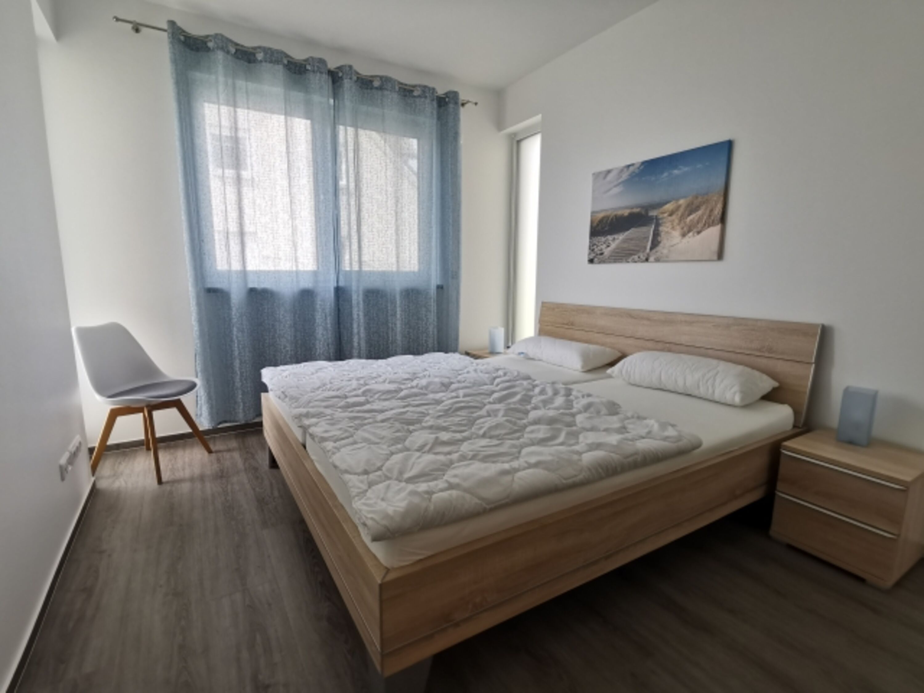 Schlafzimmer mit Doppelbett