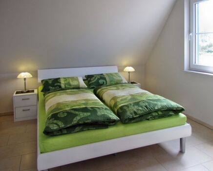 Schlafzimmer 1 mit Doppelbett