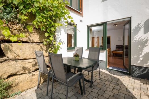 die wohnungseigene Terrasse