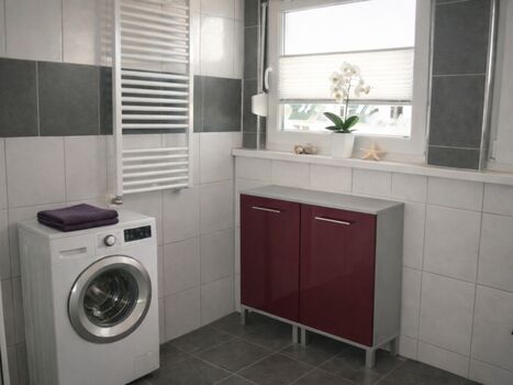 Duschbad mit Waschmaschine