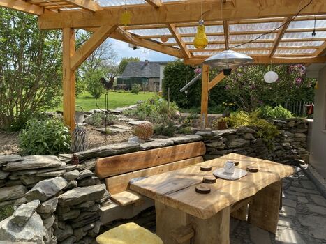 Übedachung mit Sitzplaz