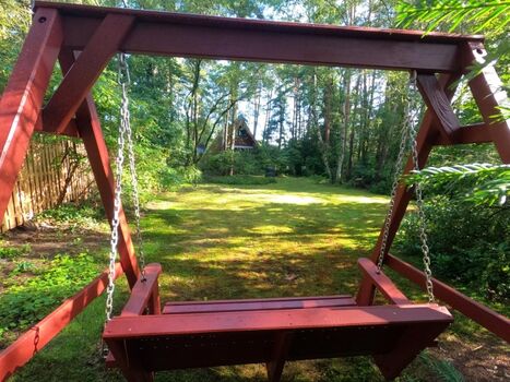 Der eingezäunten Garten mit Blick zum Ferienhaus 