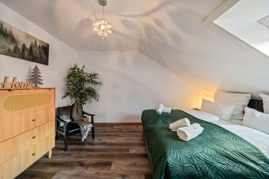 Schlafzimmer mit King Size Bett