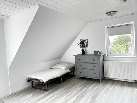 Zustellbett im Wohnzimmer