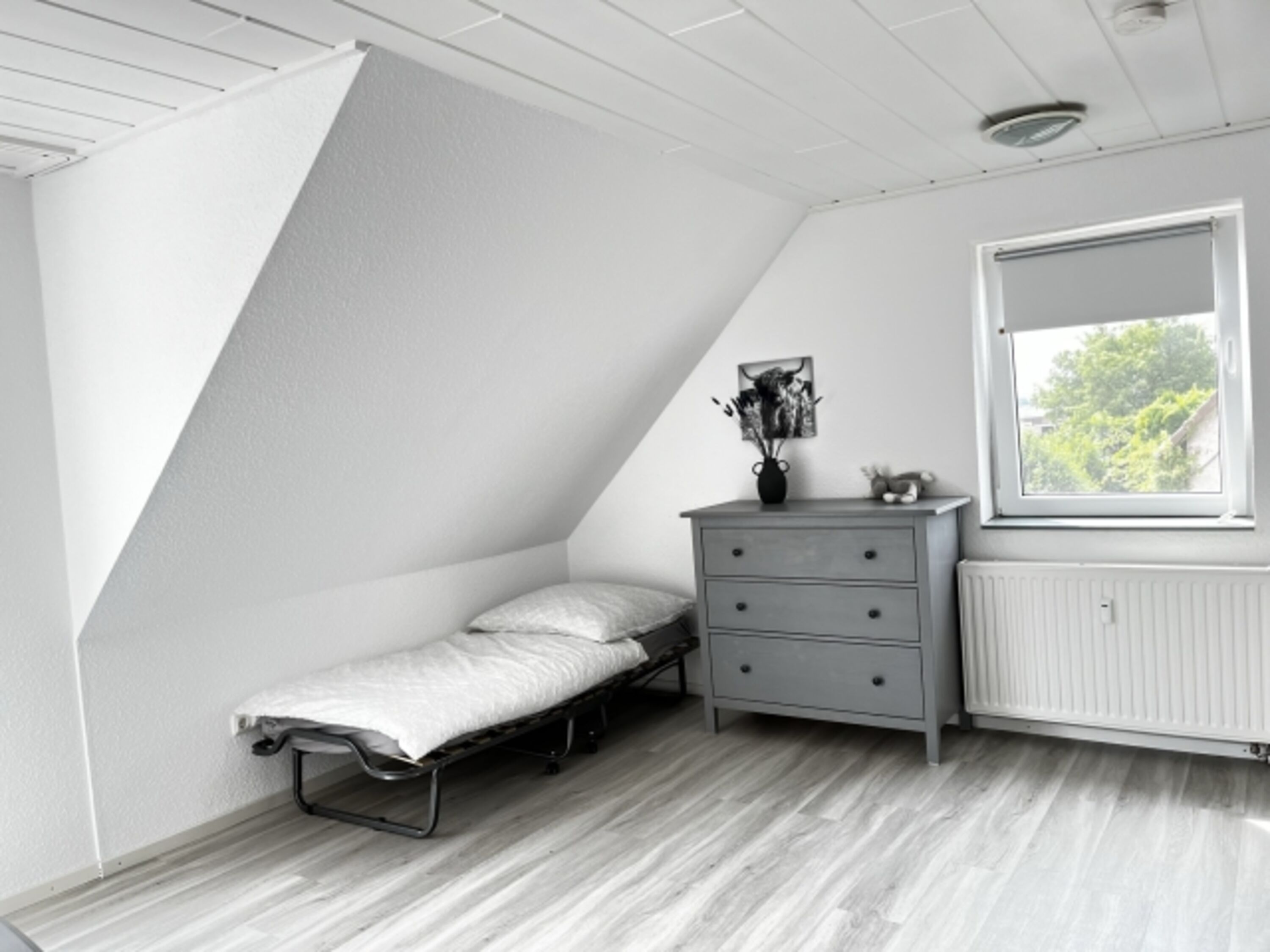 Zustellbett im Wohnzimmer