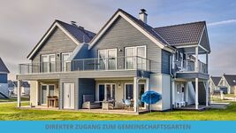 Erdgeschoss mit Kamin, Sauna und Zugang zum Garten 