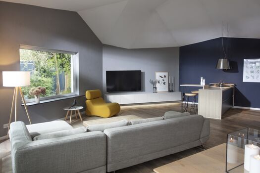 Wohnbereich von 70 qm mit offene Küche, wohnbereich und Essbereich mit Blick in den Garten