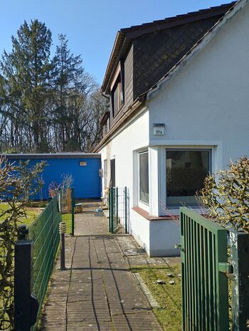 Der Eingang zur Wohnung und in Ihren Garten