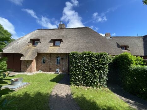 Von unserem Garten aus gelangt ihr zur Waschküche