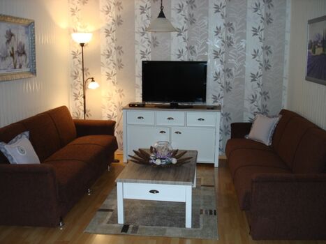 Wohnzimmer mit 2 Schlafsofas