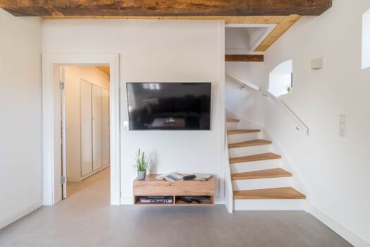 Wohnzimmer/Treppenaufgang