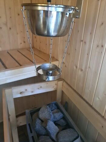 Saunaofen mit halbautomatische Aufgussvorrichtung