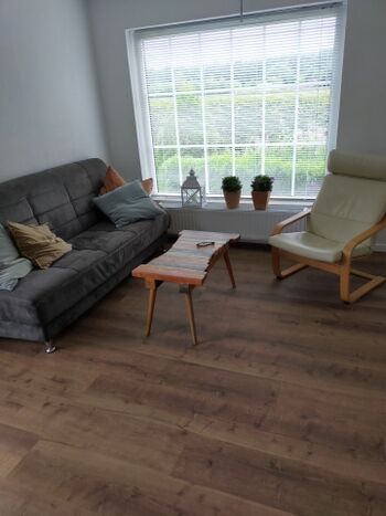 Die Sitzecke mit Schlafsofa