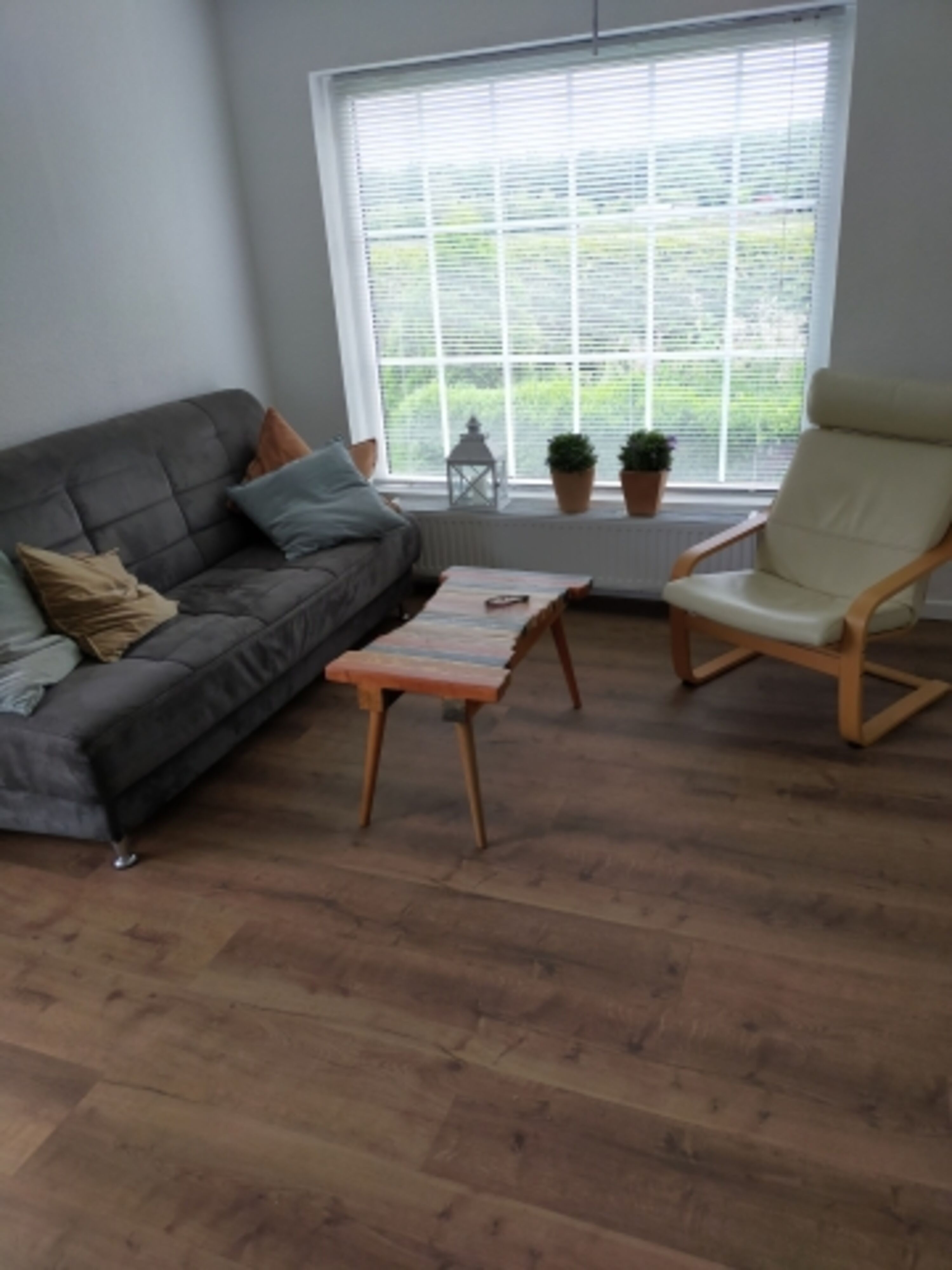 Die Sitzecke mit Schlafsofa